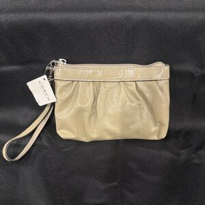 Coach Shimmering Beige Wristlet Clutch